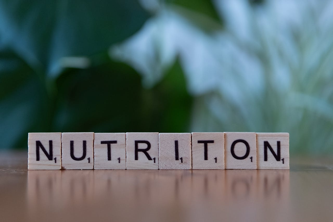 Crafting Captivating Headlines: Your awesome post title goes here Wooden tiles spelling 'nutrition' on a table with blurred background.